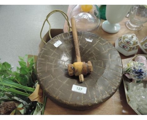A vintage brass cast and hand worked gong