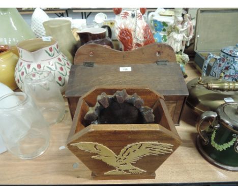A selection of vintage treen wood items including display stand and candle box