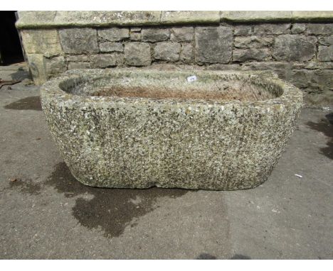 An unusual rough hewn stone trough of rectangular form 90 cm in lenght 