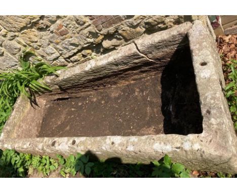 An ancient limestone trough, complete but restoration required, 245 cm x 100 cm x 43 cm (this lot can be viewed by appointmen
