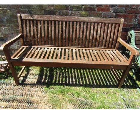 A teakwood garden bench with slatted seat and back, 160 cm length 