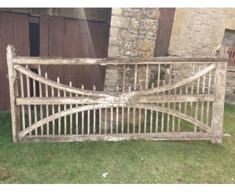 Early 20th century oak and pine entrance gate with original iron work fittings for restoration, 290 cm in length (plus hinges