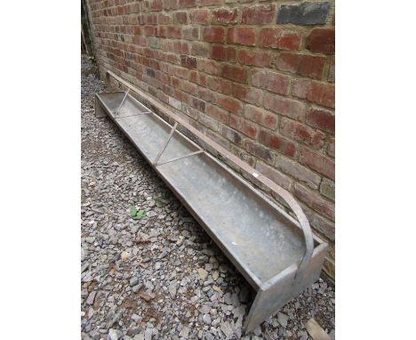A galvanised iron field sheep feeding trough, 2.8 metres in length 