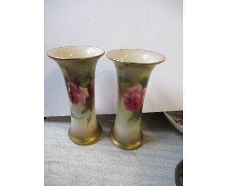 A pair of Royal Worcester trumpet vases, decorated with roses, shape number G923, height 4.5ins - Both are in good condition