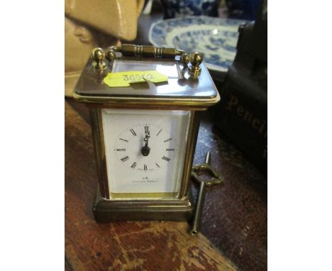 A Matthew Norman miniature carriage clock