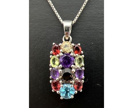 A Genuine Gem Company multi stone set pendant in a silver mount, on an 18" silver box chain. Pendant approx. 3cm drop, stones