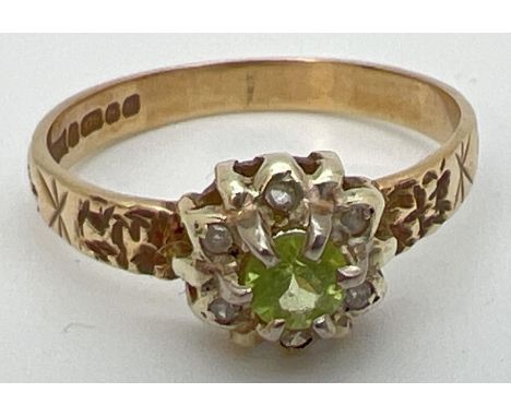 A vintage 9ct gold Prasiolite and diamond cluster ring with engraved detail to shoulders. Central round cut prasiolite, appro