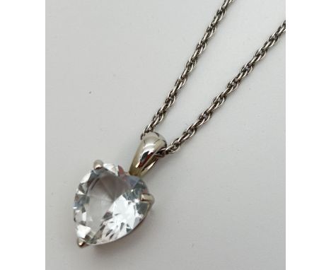 A heart shaped clear stone pendant on a 24" silver rope chain with spring ring clasp. Pendant unmarked, approx. 2.5cm drop. 