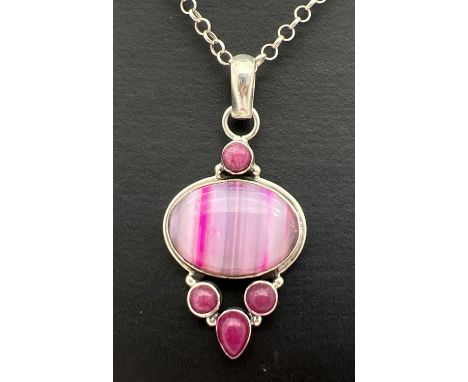 A silver and pink multi stone pendant on a 16" silver belcher chain with spring ring clasp. Pendant stamped 925 to reverse an