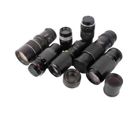 A group of camera lenses, including an Optomax autozoom 1:5.4 F=80mm-250mm, serial no. 7500834, a Miranda MC macro 75-300mm l