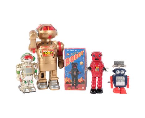 A Vintage 1986 Tomy Toby walking talking robot, a mechanical "Roby" robot, in quantity of box, and 2 other Vintage plastic ro