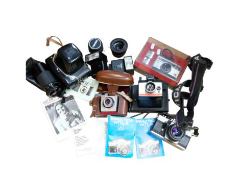 A quantity of Vintage cameras and equipment, including various Carl Zeiss Jena and Hanimex lenses, a Polaroid Colourpack 80, 