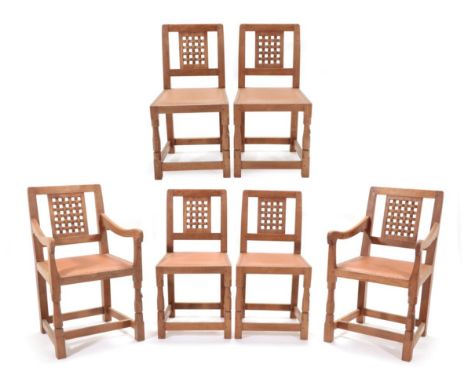 Mouseman: A Set of Six (4+2) Robert Thompson of Kilburn English Oak Lattice Back Dining Chairs, with nailed hide upholstered 