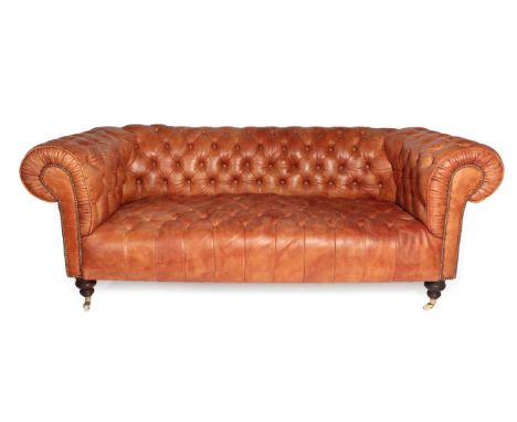 The Sofa Company Brown Buttoned Leather Chesterfield Sofa, dated 13/06/10, with rounded and close nailed arm supports, raised