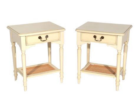 A Pair of Laura Ashley Ivory Painted Clifton Range Bedside Tables, modern, each with single frieze drawer, on turned tapering