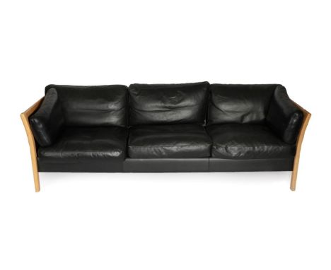 A Danish Friss Three-Seater Sofa, upholstered in black leather, with eight cushions and leather back support and sides, 212cm