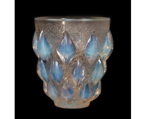 René Lalique (French, 1860-1945): An Opalescent, Clear and Frosted Rampillon Glass Vase, moulded with protruding lozenges  on