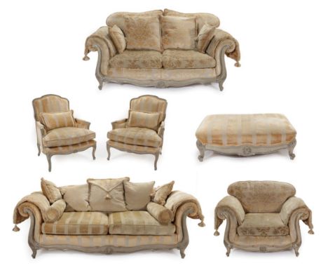 A Two-Seater Sofa and Matching Armchair, modern, upholstered in cream floral fabric, with rounded arms and an en grisaille pa