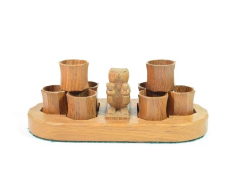 Beaverman: A Colin Almack of Sutton-under-Whitestonecliffe English Oak Napkin Ring Stand, with carved standing beaver holding