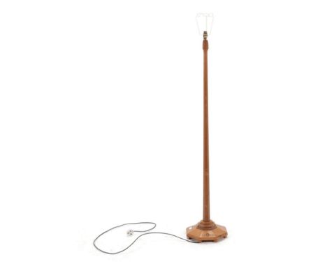 Acorn Industries: A G.J.Grainger and Sons of Brandsby English Oak Standard Lamp, the tapering octagonal column on a stepped o