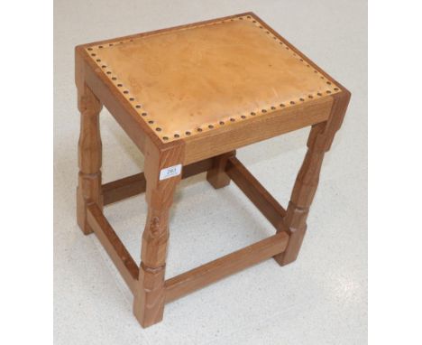 Mouseman: A Robert Thompson of Kilburn English Oak Dressing Table Stool, with upholstered cow hide seat, on four octagonal le