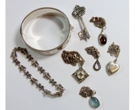 A silver bangle 27g, a sliver marcasite butterfly bracelet 9g and three silver necklaces plus Eiffel Tower key brooch and ano