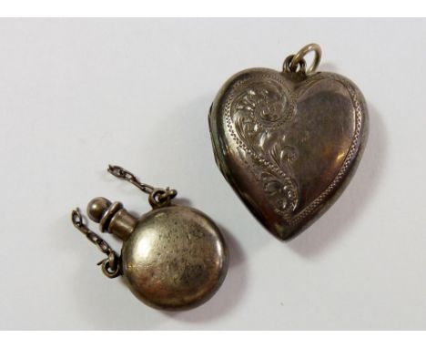 A silver heart locket and a silver miniature scent flask 