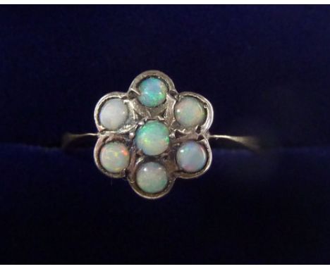 A silver and 9 carat gold opal cluster ring, size L 