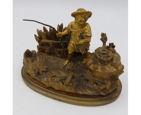 A 19th century gilt bronze inkwell in the form of a child fishing, 13.5 cm wide 