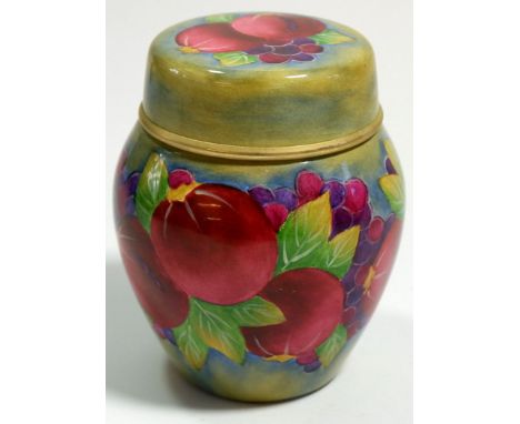 A Moorcroft enamel miniature ginger jar and cover painted pomegranate on a green ground, 7cm 