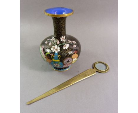 A Chinese brass paperknife with integral magnifying glass and an enamel vase 