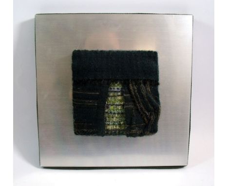 A miniature tapestry panel mounted on aluminium by Maureen Hodges (Scottish b.1941) - Black Tent 1977 with poem to verso 