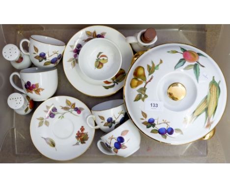 A Royal Worcester Evesham group including: tureen, four cups and saucers, five tea plates, salt, pepper, oil and sugar 