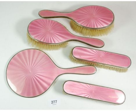 A silver and pink enamel dressing table set, London 1940 