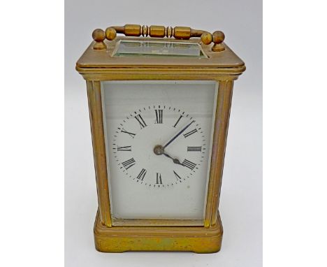 A brass carriage clock with key, 11.5cm 