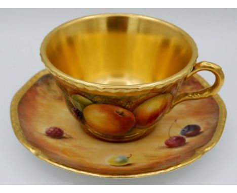 A Royal Worcester cabinet cup and saucer painted by D M Fuller, boxed with certificate 