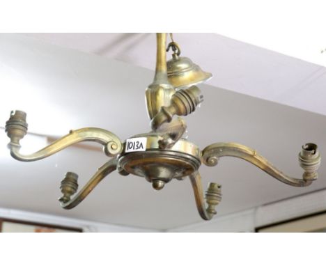A brass finish five branch chandelier style light fitting 