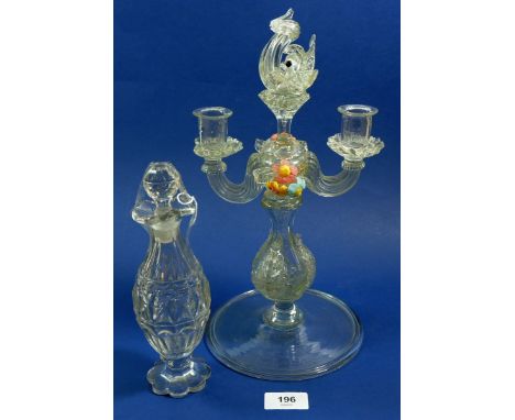 A Venetian glass candlestick with floral decoration and dolphin surmount, some damage, 31 cm, and a Georgian cut glass liquor
