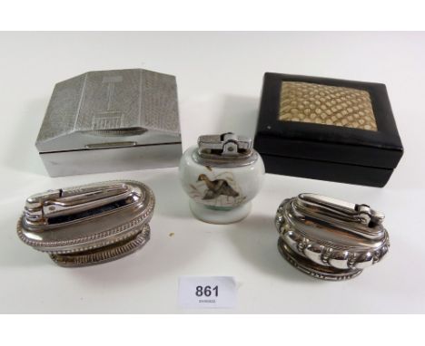 A Ronson silver plated table lighter and two others, a white metal Art Deco cigarette box and black leather and 'snakeskin' o