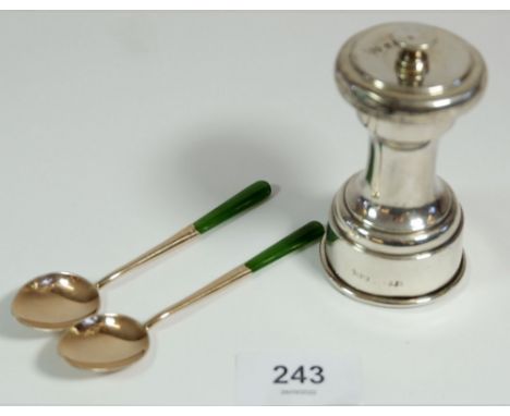 A silver pepper grinder, Birmingham 1932 and a pair of silver coffee spoons with jade handles