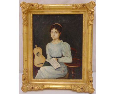 An early 19th century framed oil on canvas portrait of a seated lady holding a music manuscript with a guitar by her side, A/