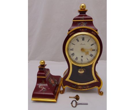 A 20th century Zenith mantle clock and wall bracket, white enamel dial with Roman numerals, single train movement, to include