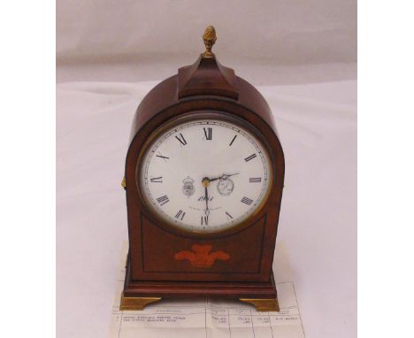 A Royal Wedding mantle clock, mahogany case, white enamel dial with Roman numerals with brass pineapple finial and four brack