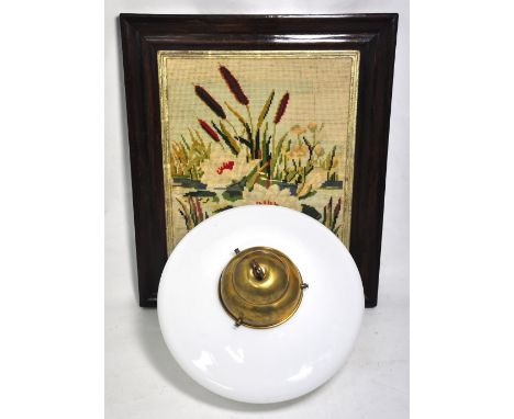 A large white glass and brass ceiling light, approx height 35cm and a tapestry of lilies, framed and glazed, 34 x 40cm.