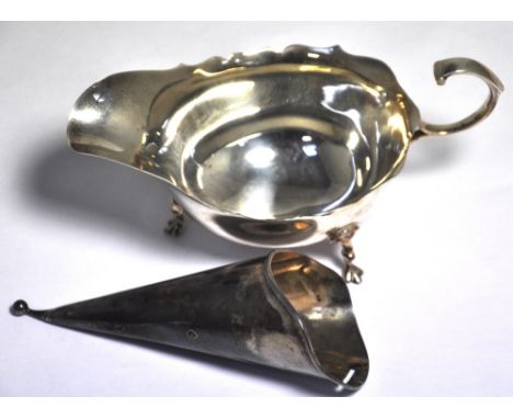 A George V hallmarked silver posy holder, Chester 1910 and an Elizabeth II hallmarked silver sauce boat, Birmingham 1960, com