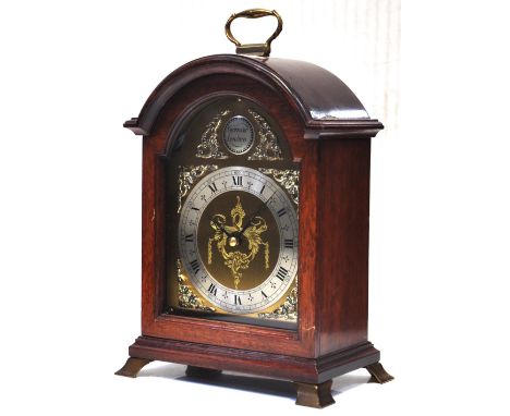 A modern Garrard of London bracket clock with silvered chapter ring and Roman numerals, height 21.5cm.