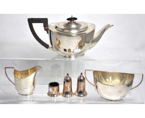 A George VI hallmarked silver tea service to include teapot, sugar bowl and milk jug, Birmingham 1947, approx weight 39.3ozt,