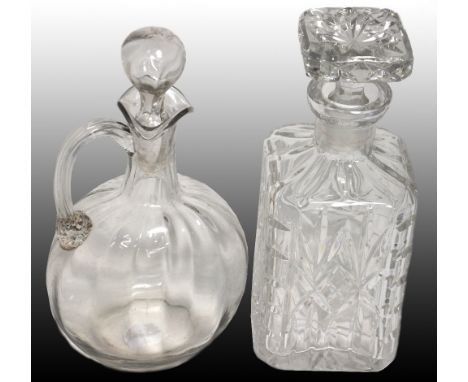 A 19th century glass claret jug and a cut glass whisky decanter, height of each 25cm (2). 