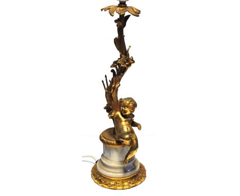 An onyx and gilt metal table lamp with cherub to the base, height including lampholder 51cm. and a brass cased "Swiza 8" carr