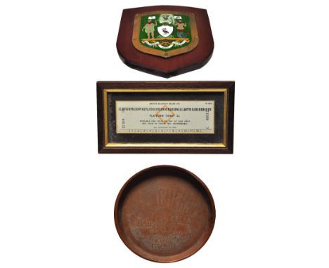 An original enamel plaque from a Liverpool tram and a framed Welsh ticket for Welsh station Lanfairpwllgwyngyllgogerychwyrndr
